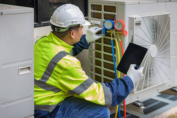 Professional Hvac technician working in Medfield, MA